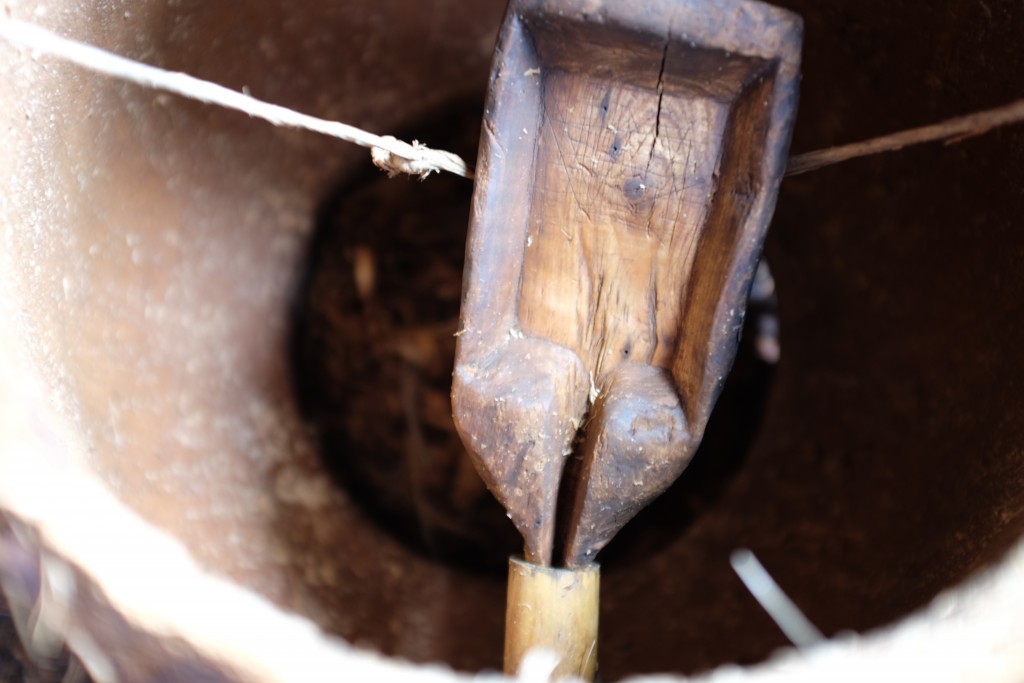 The collecting tray inside a clay pot still